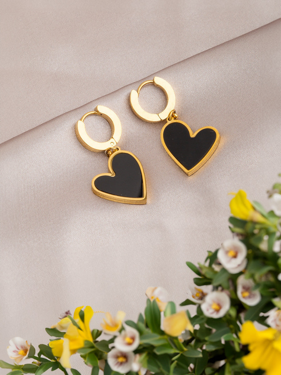 Letide earrings close-up showing textured oval detail