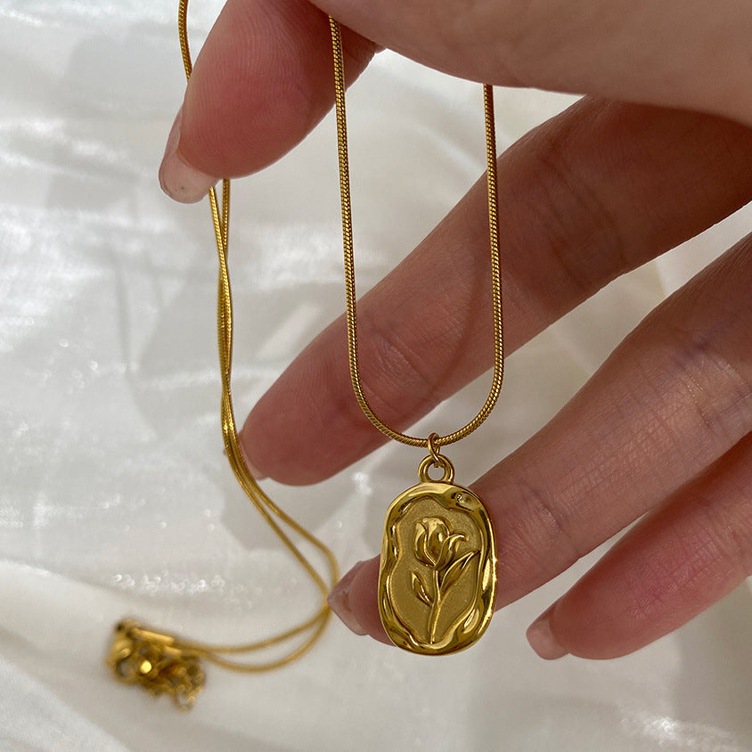 Roselove necklace close-up showing rose-inspired detail
