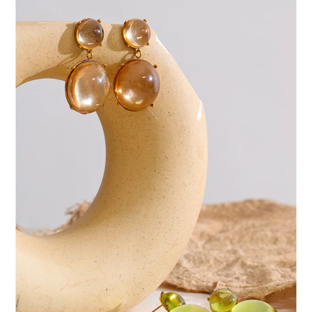 Close-up of polished gold-tone earring surface
