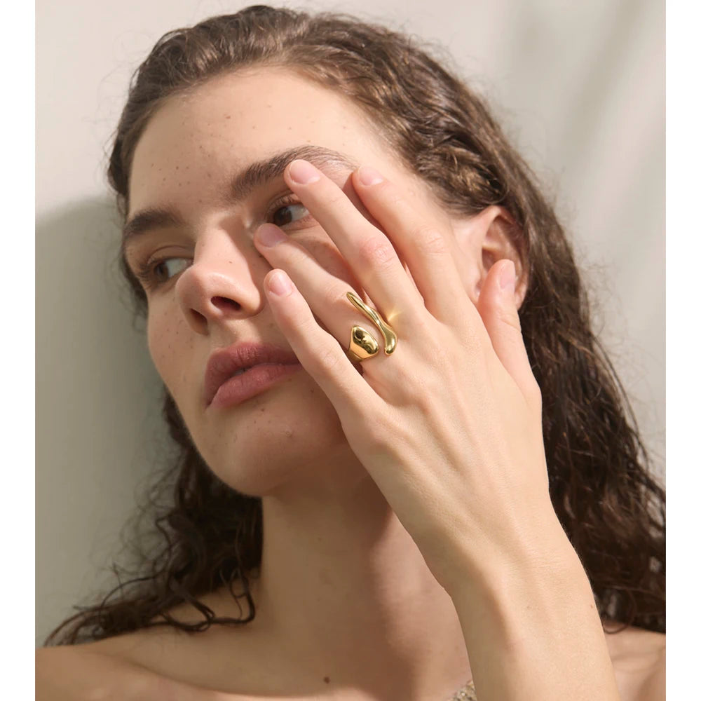 Armita ring close-up showing sculptural geometric design