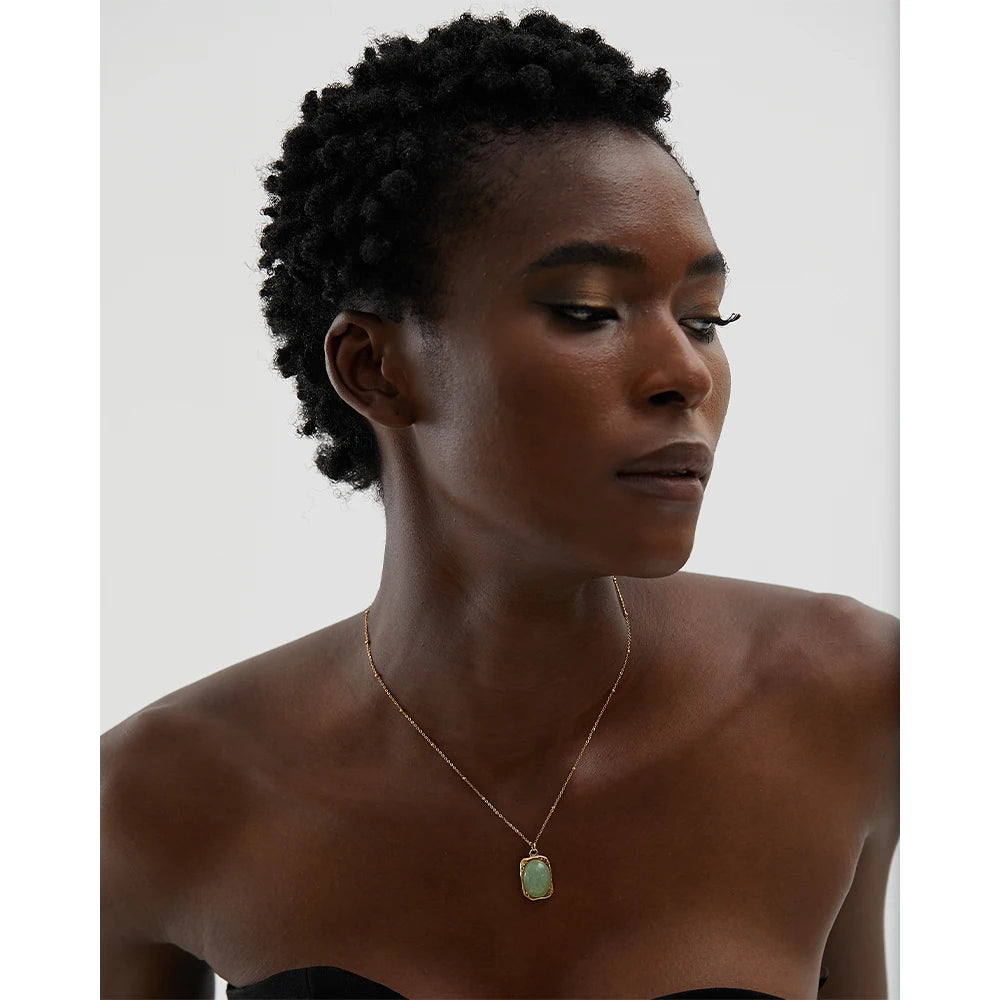 Virelle necklace close-up showing textured oval detail