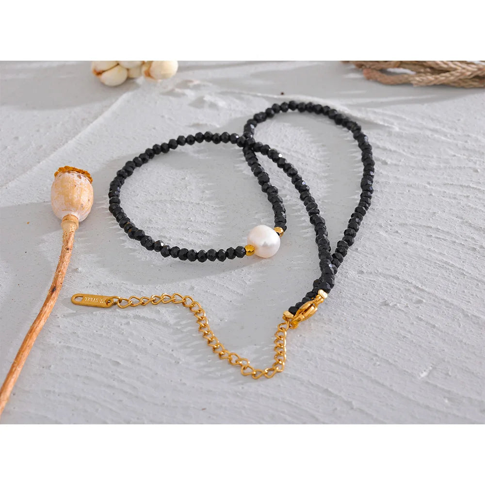 Noirelle necklace side view showing delicate chain