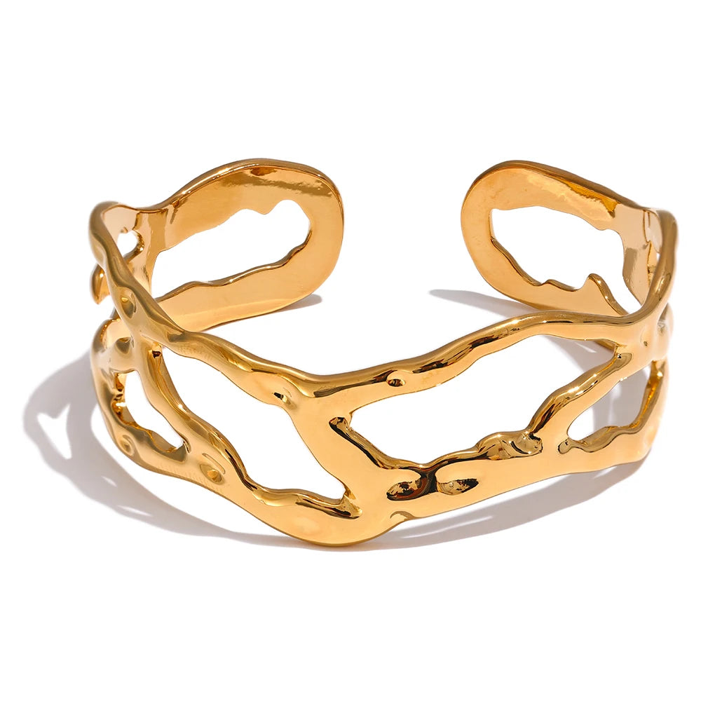 Gold stainless steel open cuff bracelet with textured polished finish
