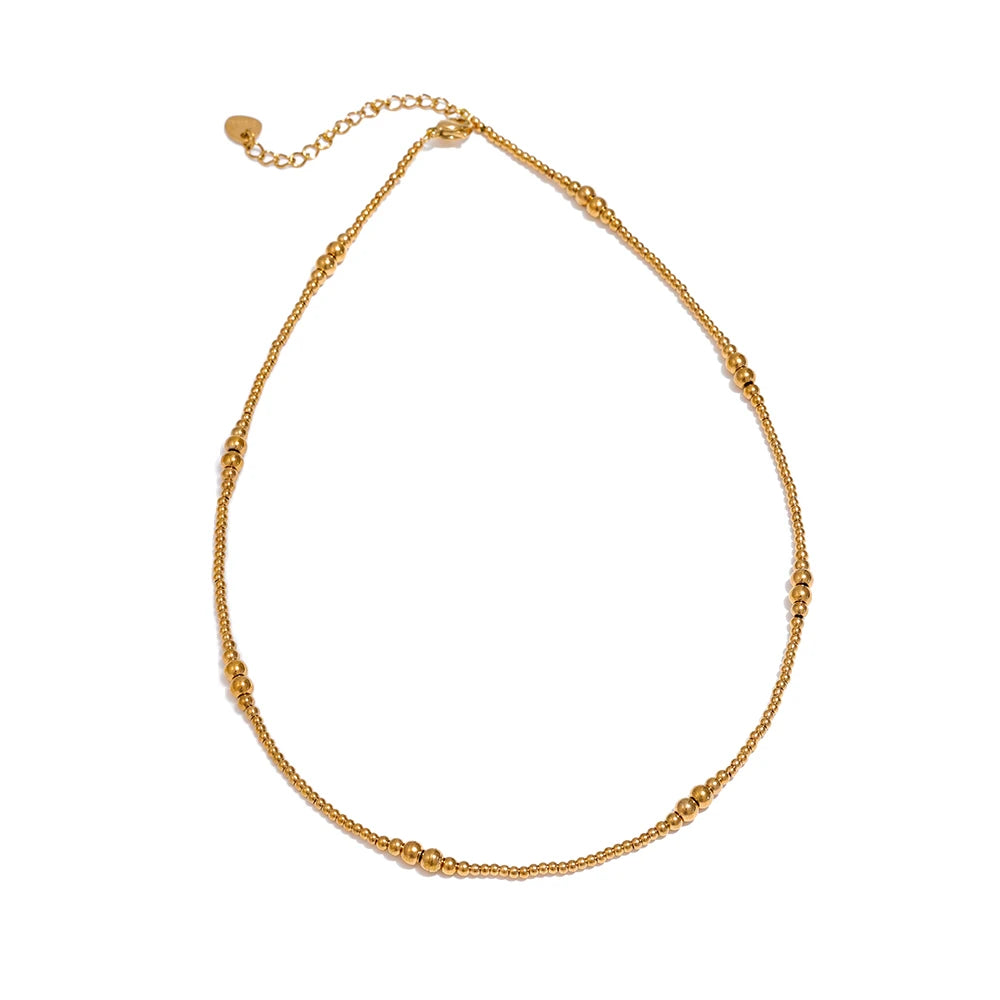 Gold stainless steel adjustable necklace with textured oval pendant