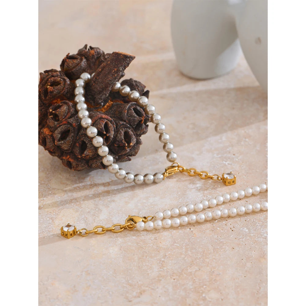 Grey stainless steel chain bracelet with simulated pearls