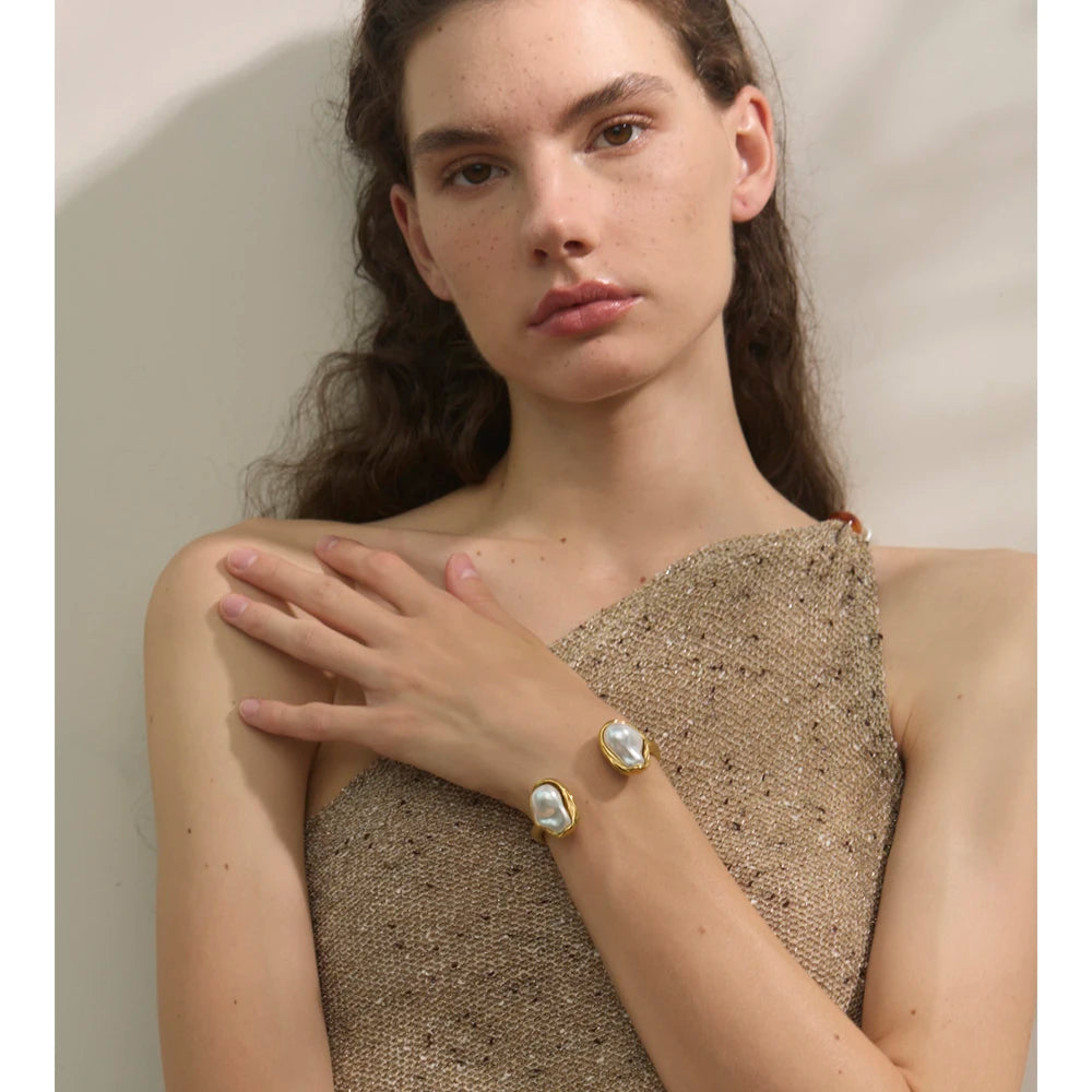 Close-up of polished gold-tone bracelet surface