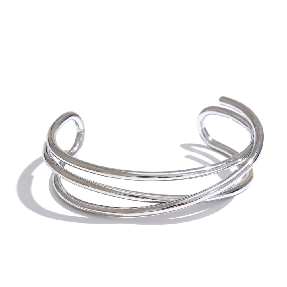 Gold stainless steel open cuff bracelet with delicate hollow-line detailing