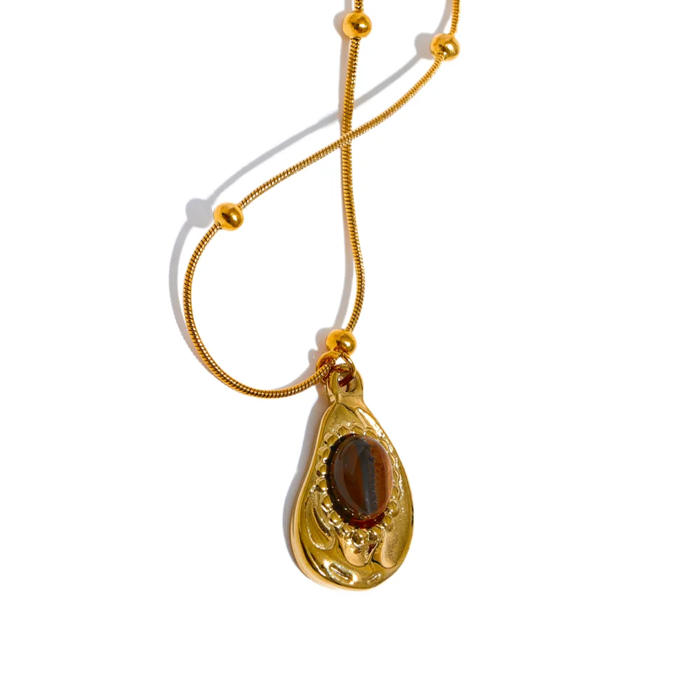 Gold stainless steel adjustable necklace with textured oval pendant