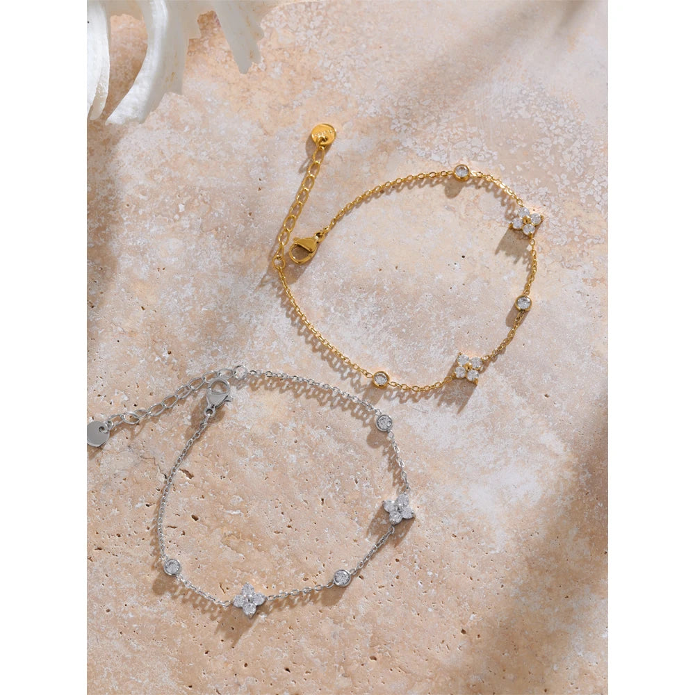 Gold stainless steel flower-inspired chain bracelet with cubic zirconia