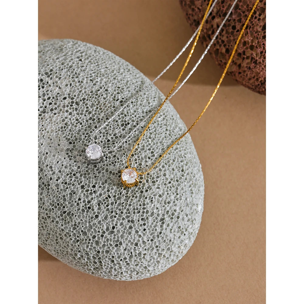 Zephyra necklace side view showing delicate chain