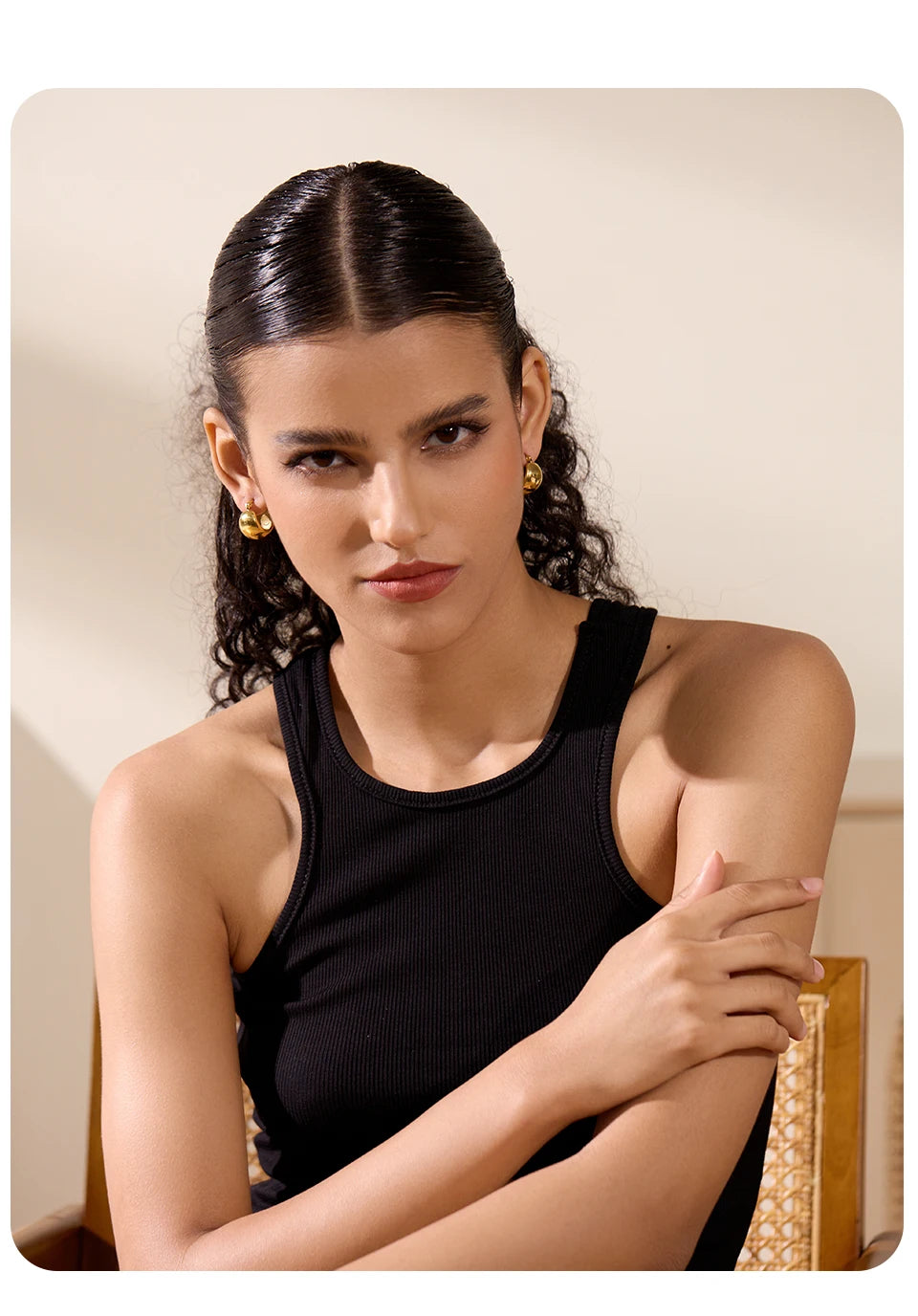 Azelia earrings detail view showing oval drop