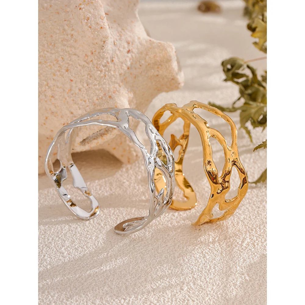 Avin bracelet shown from the side with wide hollow cuff silhouette