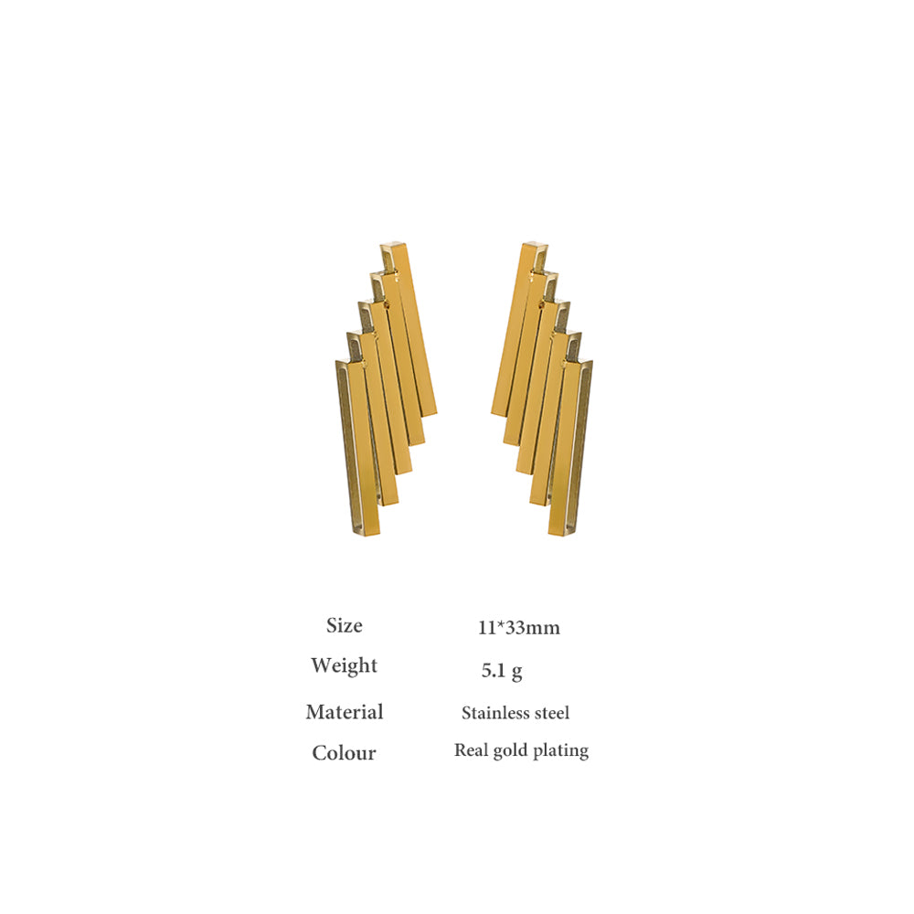 Zomorod earrings displayed on a neutral background