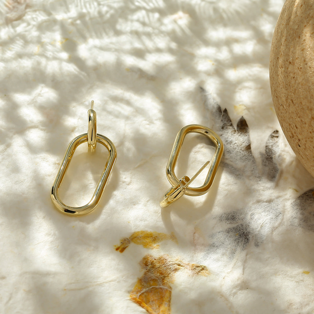 Yaqoot earrings styled as modern everyday jewelry