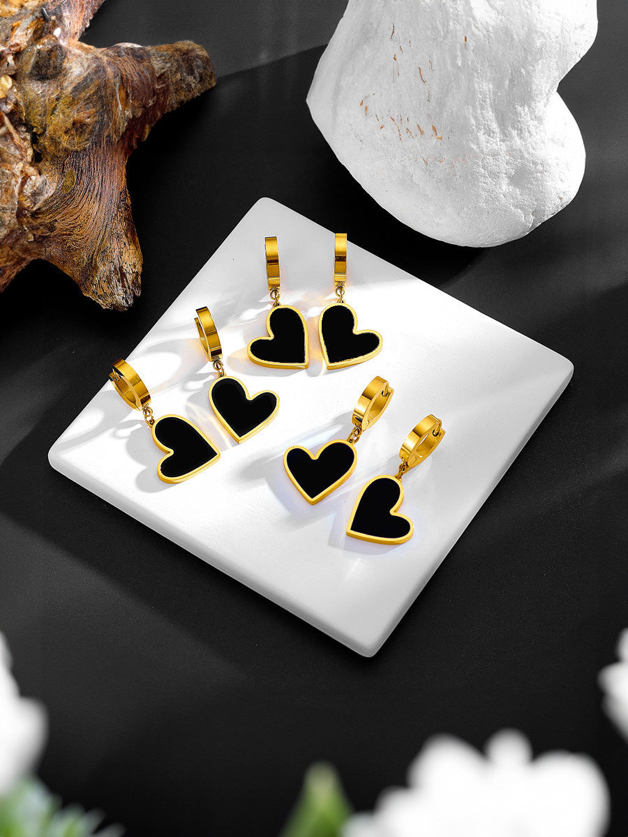 Letide earrings displayed on a neutral background