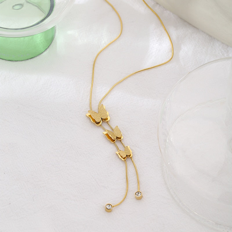 Close-up of polished gold-tone necklace surface