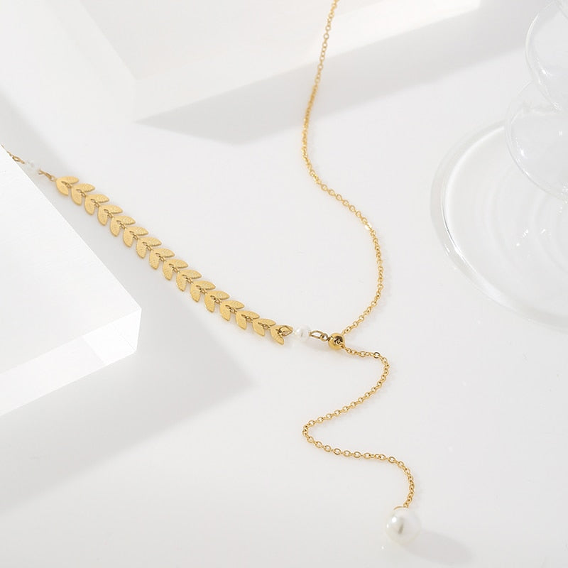 Close-up of polished gold-tone necklace surface