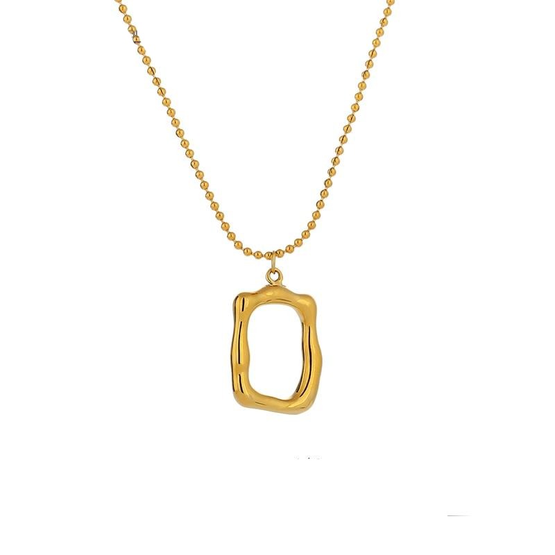 Gold stainless steel adjustable necklace with textured oval pendant