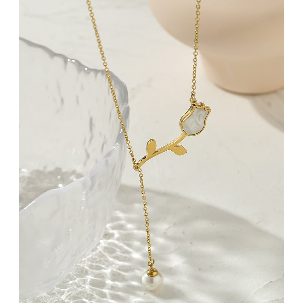 Close-up of polished gold-tone necklace surface
