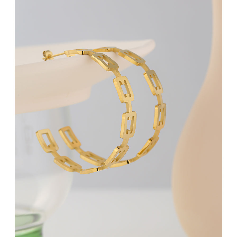 Nilash earrings styled as refined everyday jewelry