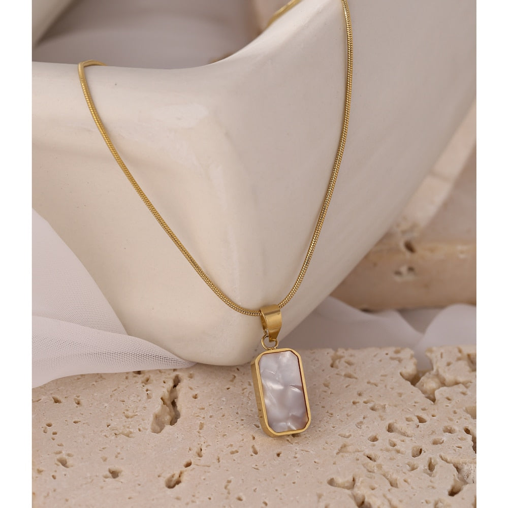Raakan necklace close-up showing textured oval detail