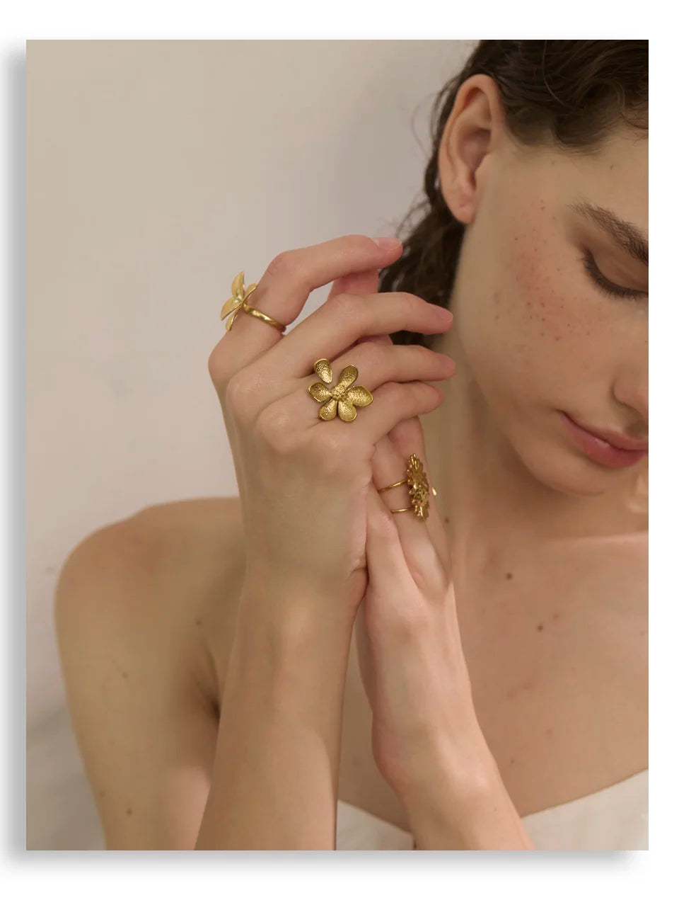 Golnar ring close-up showing flower-inspired design