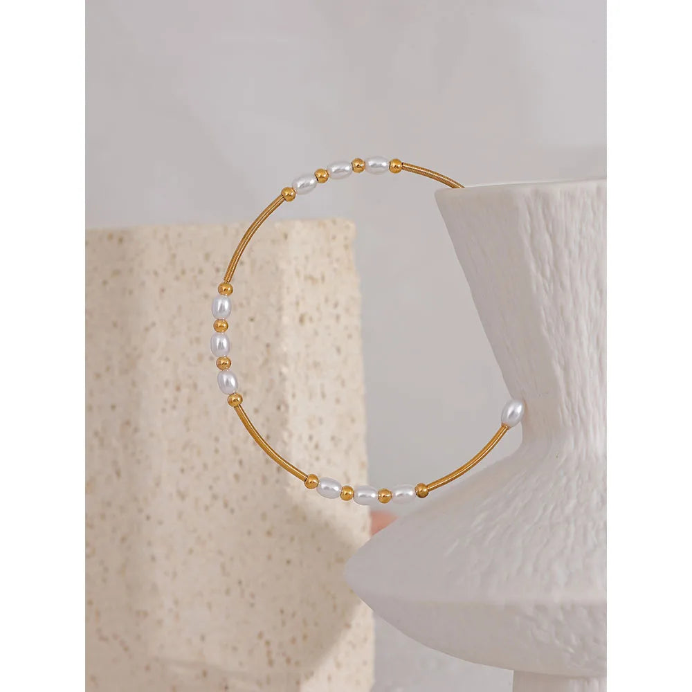Close-up of polished gold-tone bracelet surface