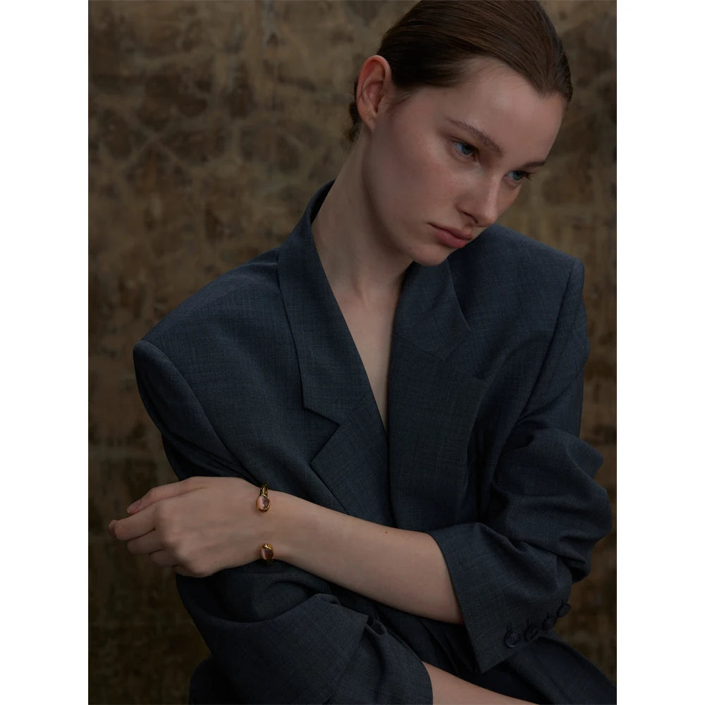 Dorna bracelet close-up showing colorful natural stone accents