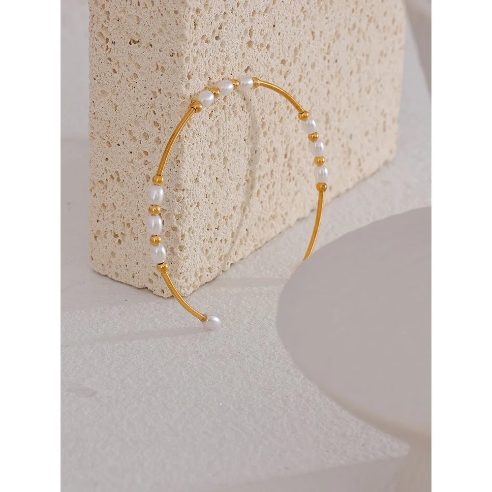 Tannaz bracelet side view showing polished cuff silhouette