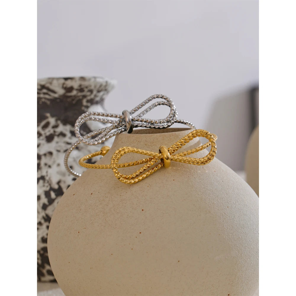 Saba bracelet close-up showing bow-knot detail