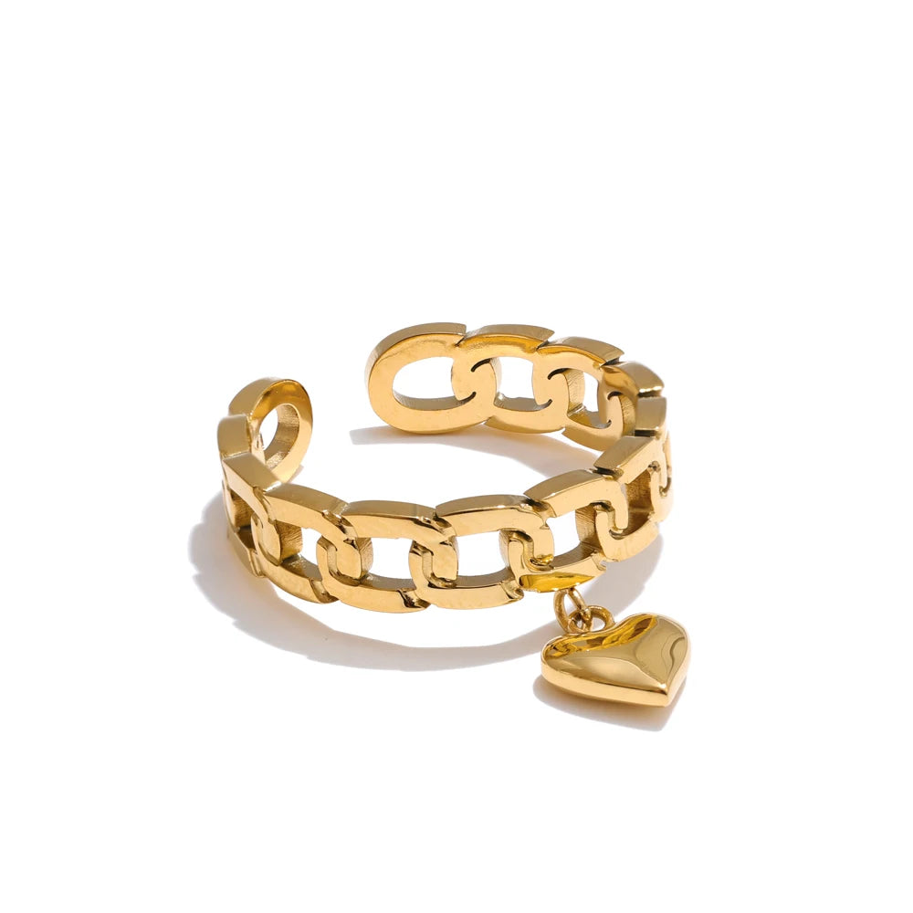 Gold stainless steel open-band ring with heart-and-chain drop detail