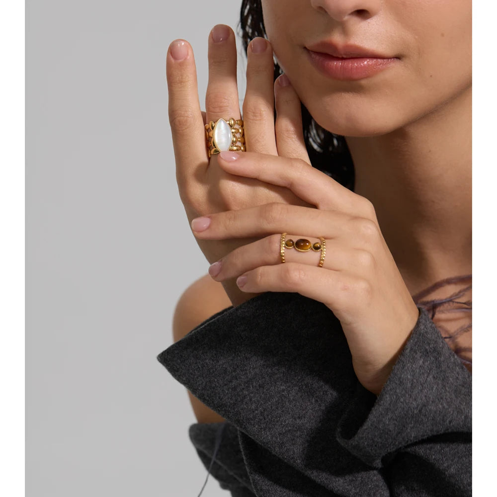 Roya ring styled with warm earthy tones