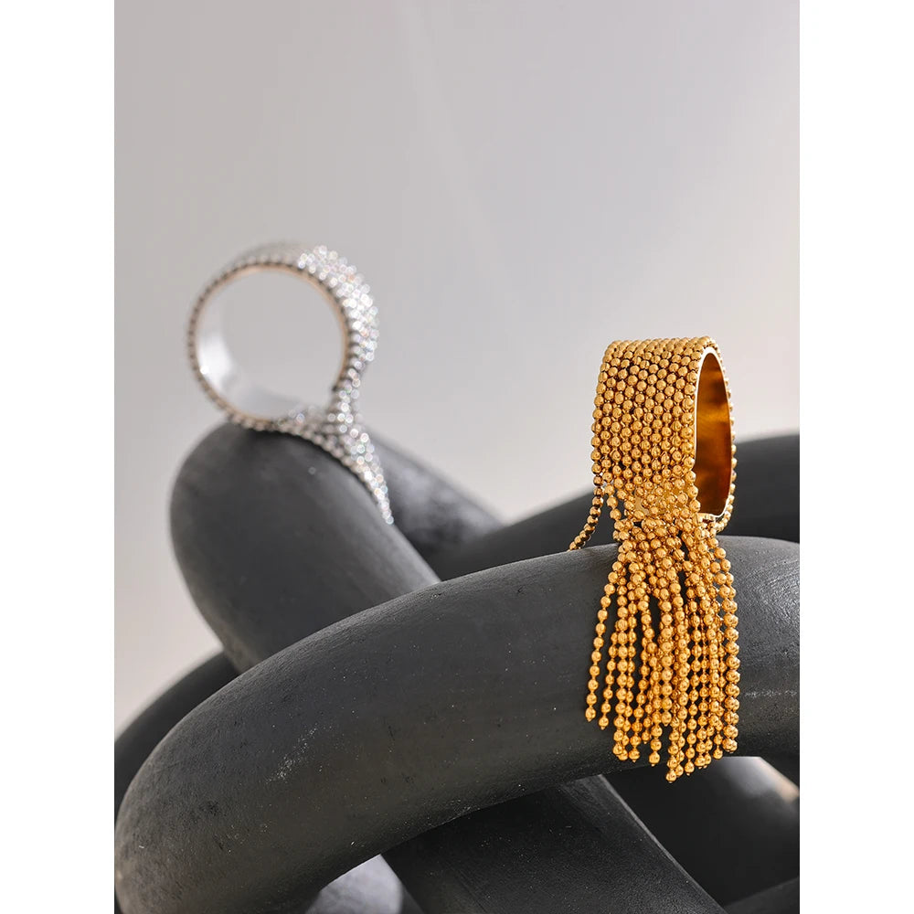 Yasna ring detail view showing tassel accents