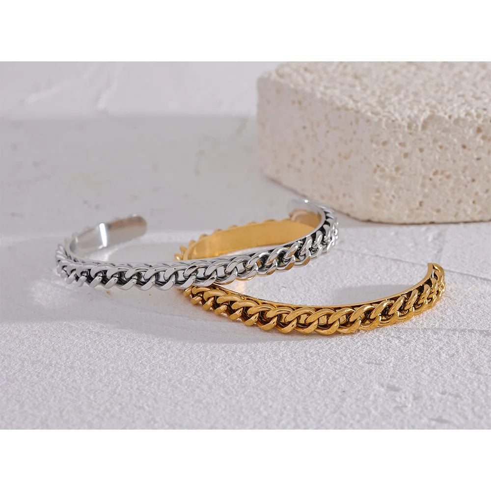 Silver stainless steel textured cuff bracelet with polished finish